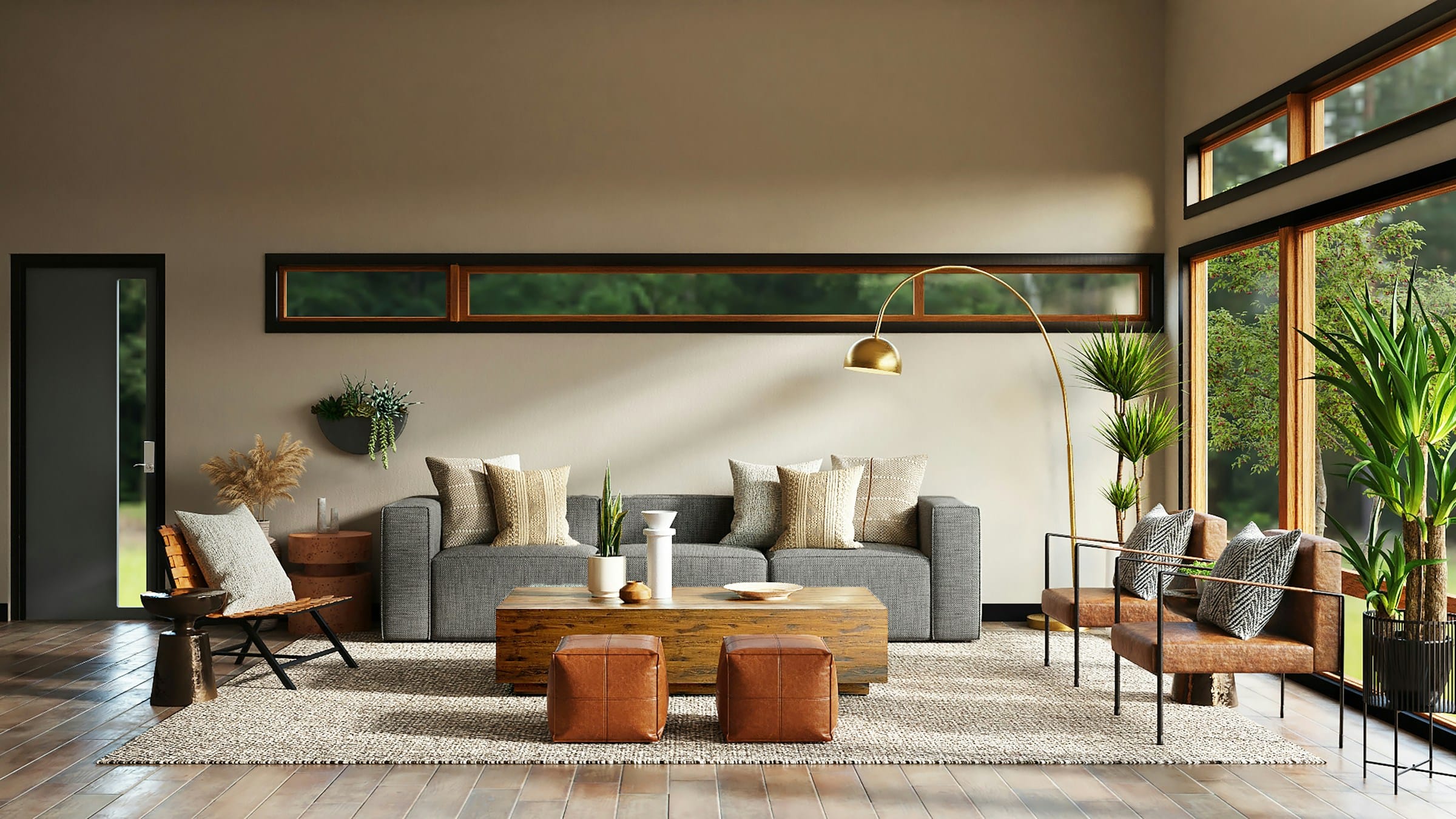 A long, light-filled living room with warm timber panelling and low grey seating